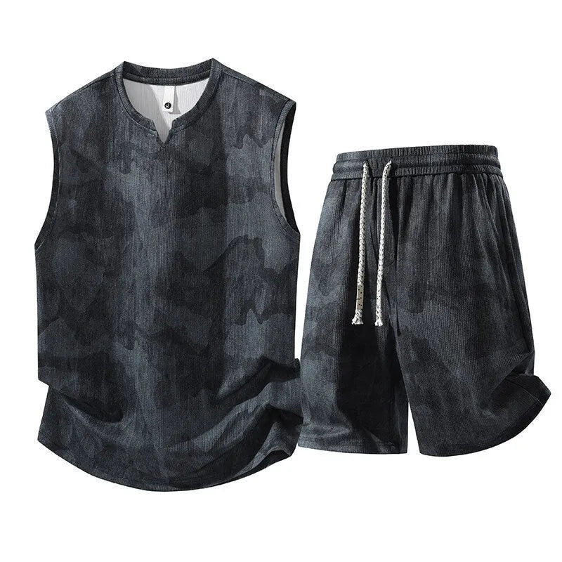 Sleeveless vest and shorts two-piece casual suit in a light denim blue colour for larger sizes.