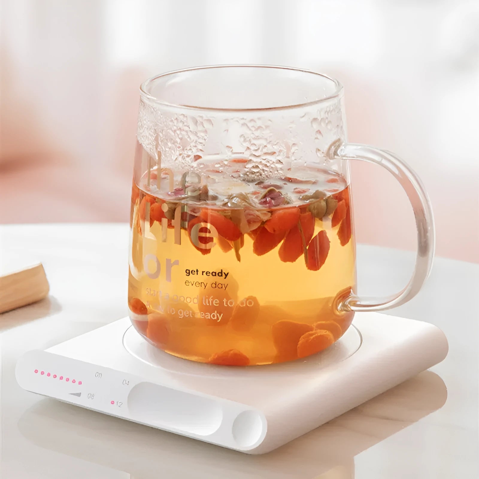 Pink and white USB-powered mechanical heating cup pad with timed warming function