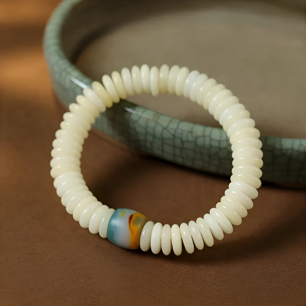 Tibetan white bodhi seed Buddhist bracelet or handheld mala with traditional knotting