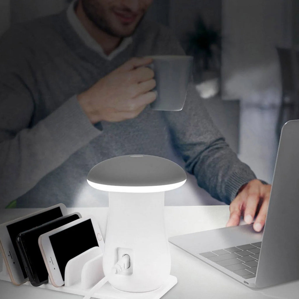 White USB charging station with five ports and mushroom-shaped LED desk lamp for multi-device charging