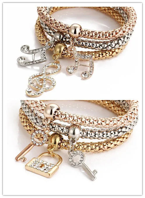 Alloy tricolour stretch popcorn corn chain bracelet set with themed charms in selected colour option