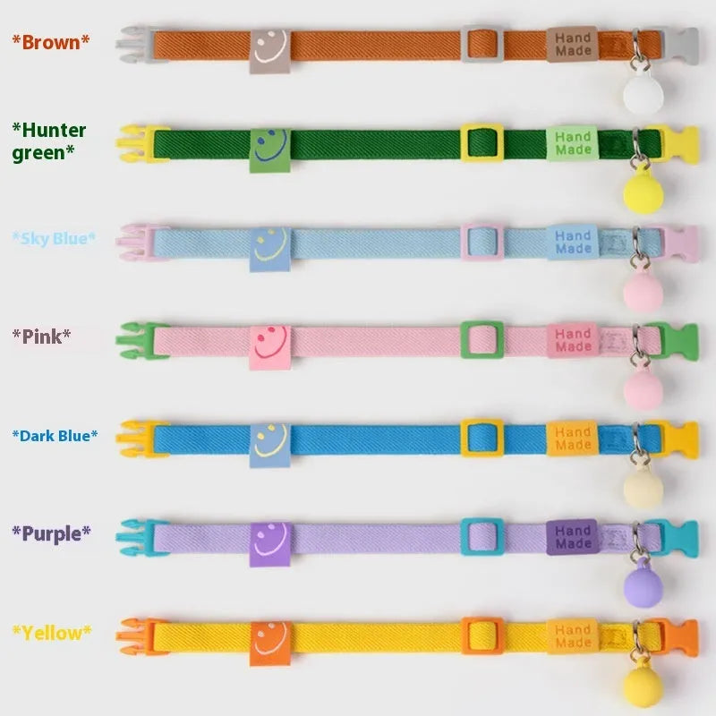Yellow high elasticity polyester dog collar for small dogs on a white background.