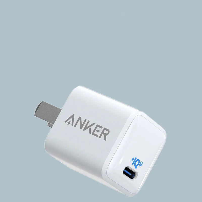 White USB travel charger for mobile phones with 5V 600mA output