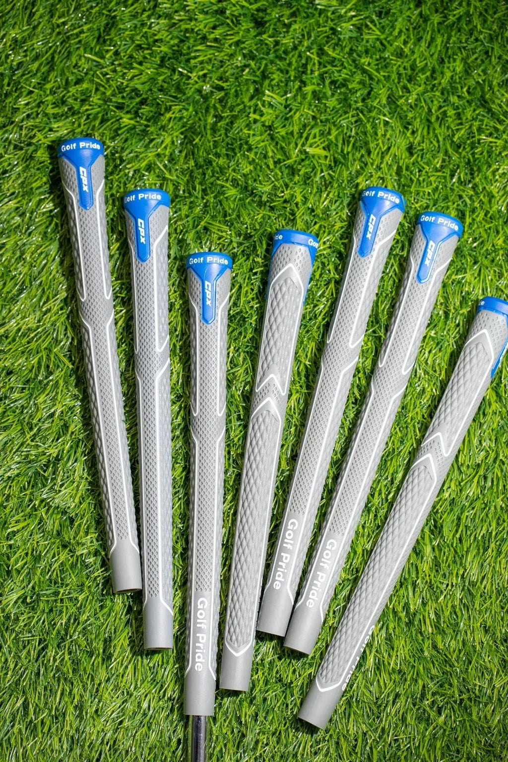 Natural rubber and cotton yarn golf club grip in female, standard, medium and large sizes