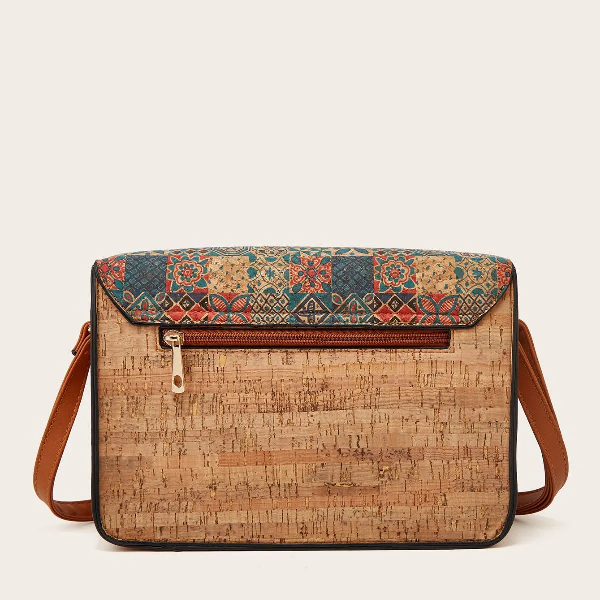 Women's printed PU leather crossbody bag in a floral design, showing single shoulder strap and large compartment.