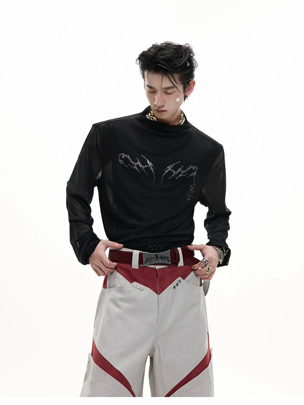 Niche Mesh Ice-feeling Slim Bottoming Shirt in black, showing long sleeves and slim fit on man.