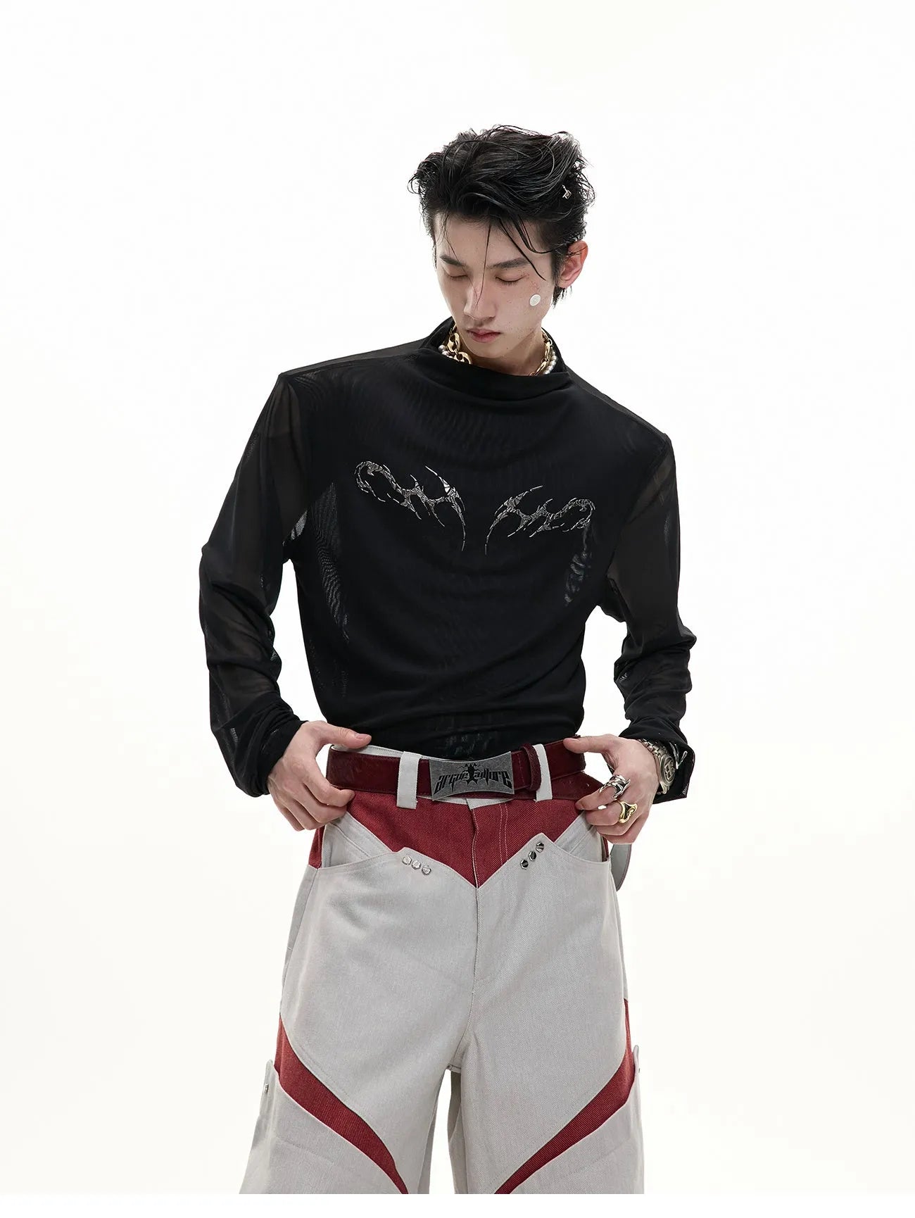 Niche Mesh Ice-feeling Slim Bottoming Shirt in black, showing long sleeves and slim fit on man.