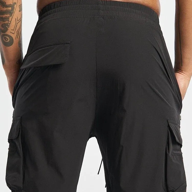 Men's black sports shorts with elastic waistband for running and gym workouts