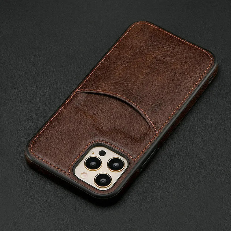 Dark blue PU leather protective case for an iPhone on a table.