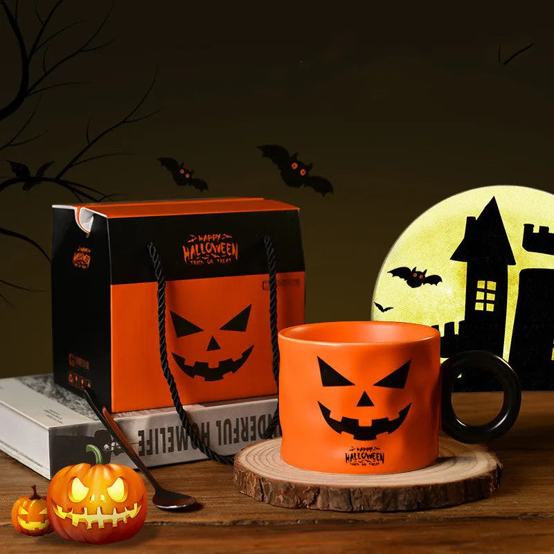 Orange pumpkin ceramic cup with handle and dessert spoon in gift box packaging