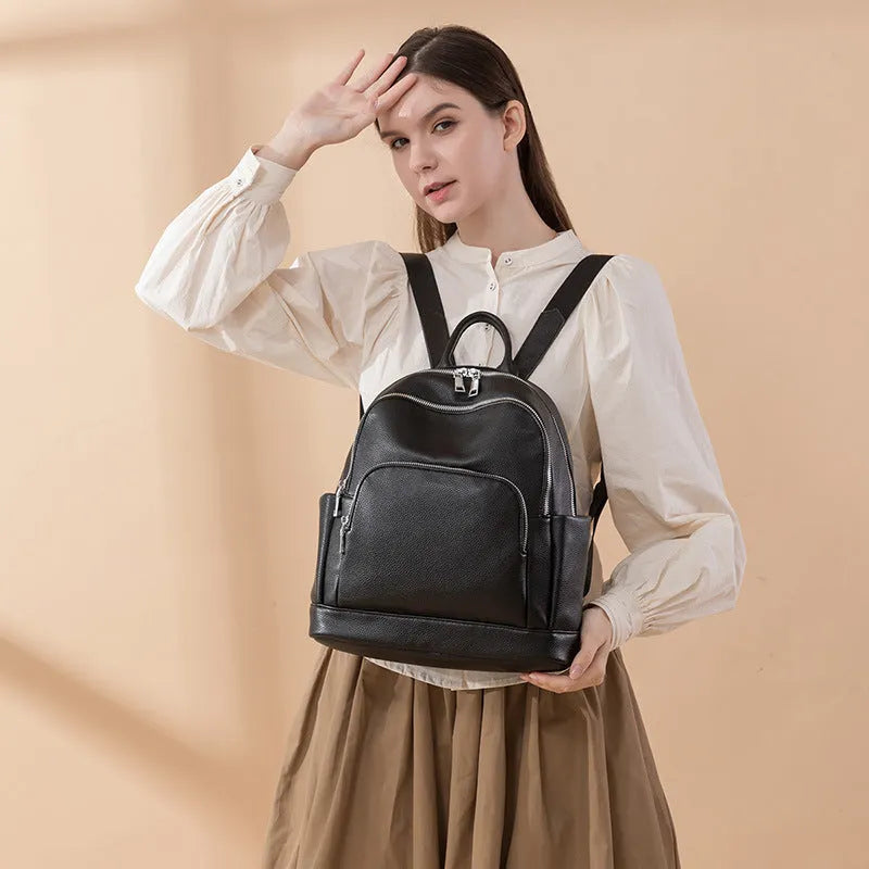 Soft PU leather women's large capacity backpack in black, tan or coffee purple with anti-theft zip and slit pocket