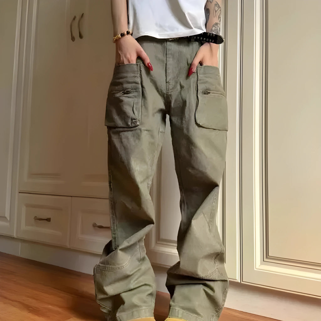 Green double zip cotton casual workwear trousers with a pocket, shown in a mid-waist fit.