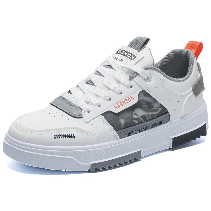 Men's white casual sneakers with lace-up front, low heel, and mesh lining, side view.