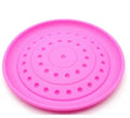 Plastic rubber dog Frisbee pet toy in assorted colours for outdoor fetch games.