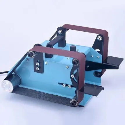 Blue desktop dual-axis belt sander for sharpening knives and tools with variable speed control.