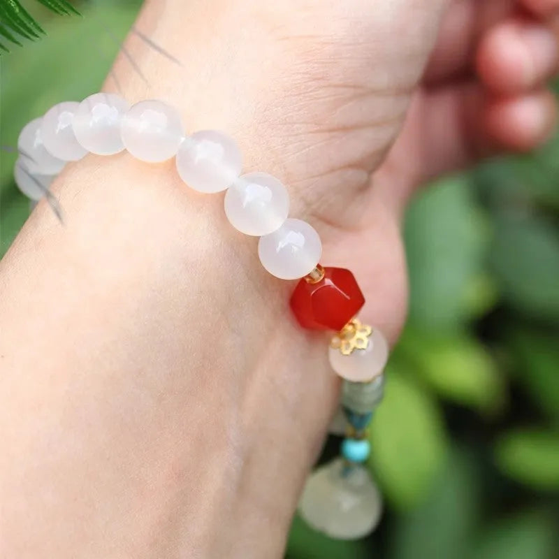 Hand-woven natural white agate bracelet with Chinese lotus seedpod beads in 10mm size