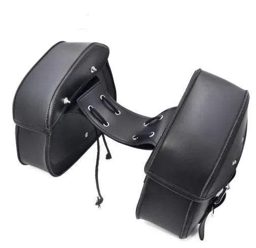 Black PU leather motorcycle saddlebags for left and right side storage, 28x18x12cm on a cruiser bike