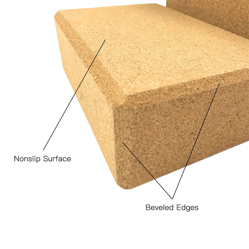 Yellow cork yoga brick with beveled edges and nonslip surface, size 24x16x8.5cm, on a plain background