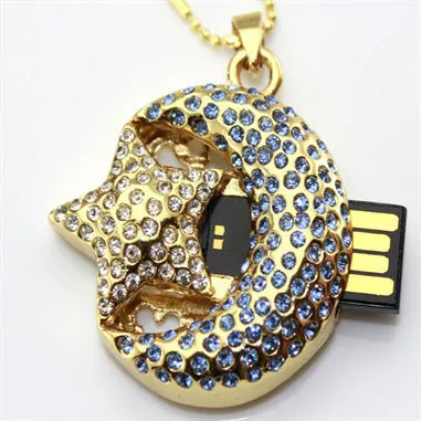 Silver metal Creative USB flash drive with USB 2.0 connector on a white background.