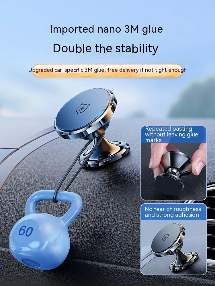 Shiny black magnetic car phone holder with adhesive dashboard mount on a car interior.
