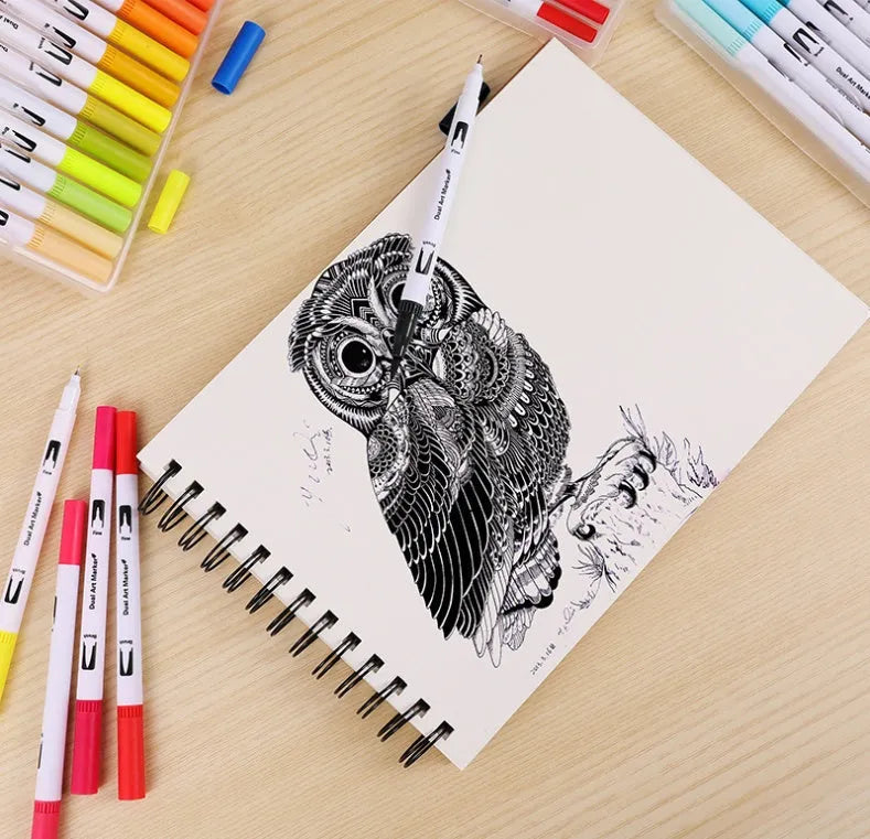 Set of dual-tip watercolour brush pens with flexible brush nibs and fine points, arranged by colour.