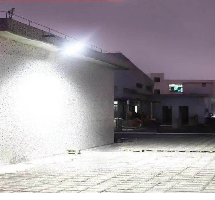Black solar motion sensor outdoor light with IP65 waterproof rating for garden and pathway illumination