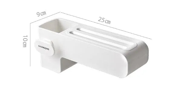 White plastic wall-mounted magnetic knife rack holding several kitchen knives