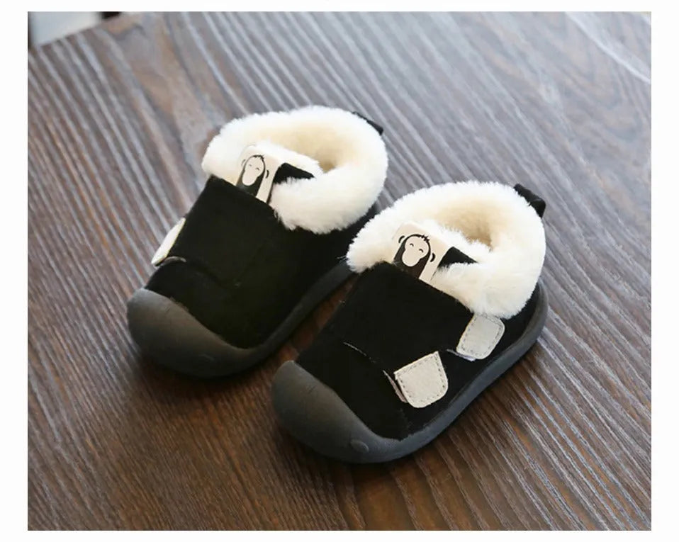 Children's velvet toddler shoes in various colours, showing non-slip sole and soft upper.