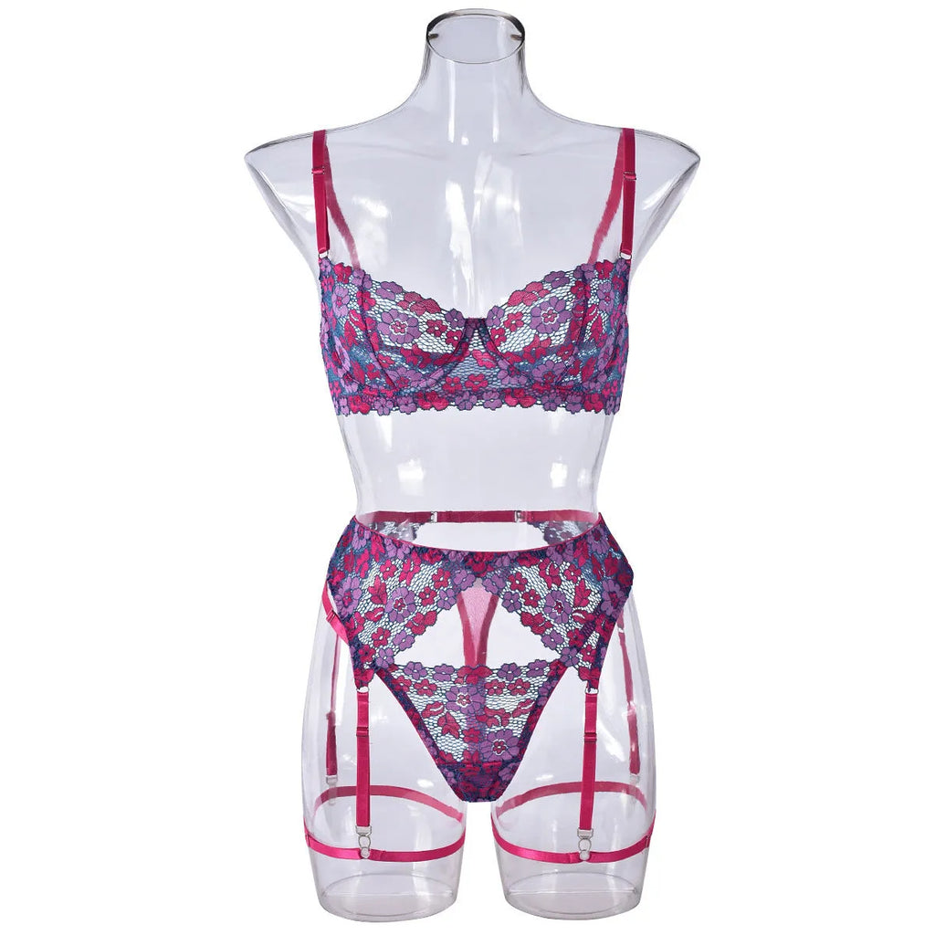 Rose red women's embroidered bikini swimsuit set on a white background.