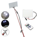 LED fishing rod light with telescopic pole extended, showing white LED array and remote control
