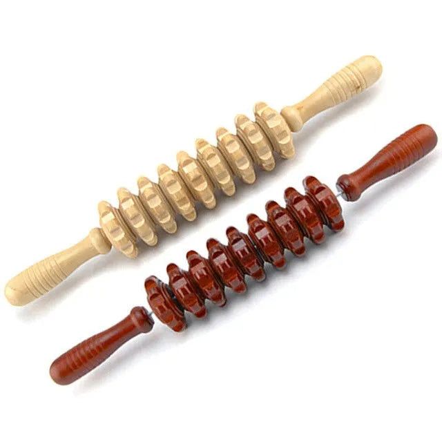 Natural wood massage stick roller approximately 38 cm long on a neutral background