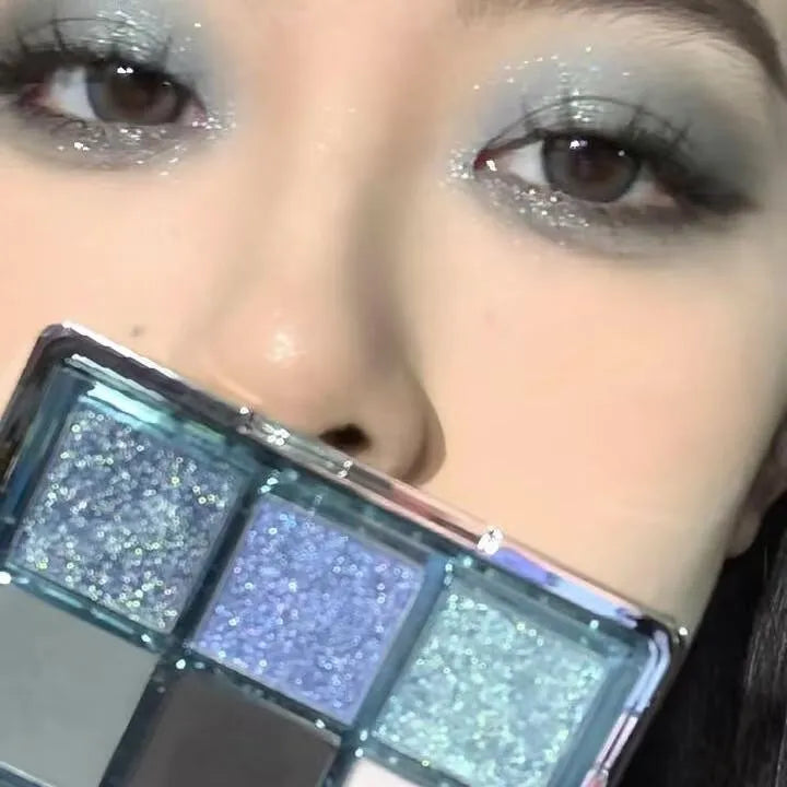MUGLEEN nine-colour eyeshadow palette 08 showing blue smoked effect and earth tones