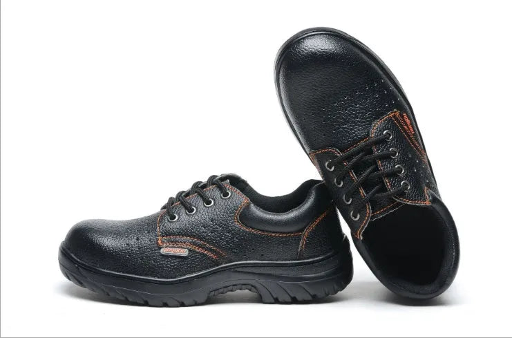 Black antiskid safety work shoes with steel toe, embossed cowhide upper, on a white background