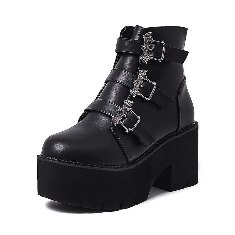 Black ladies punk Martin boots with bat buckle, thick heel, side zip, and round toe.