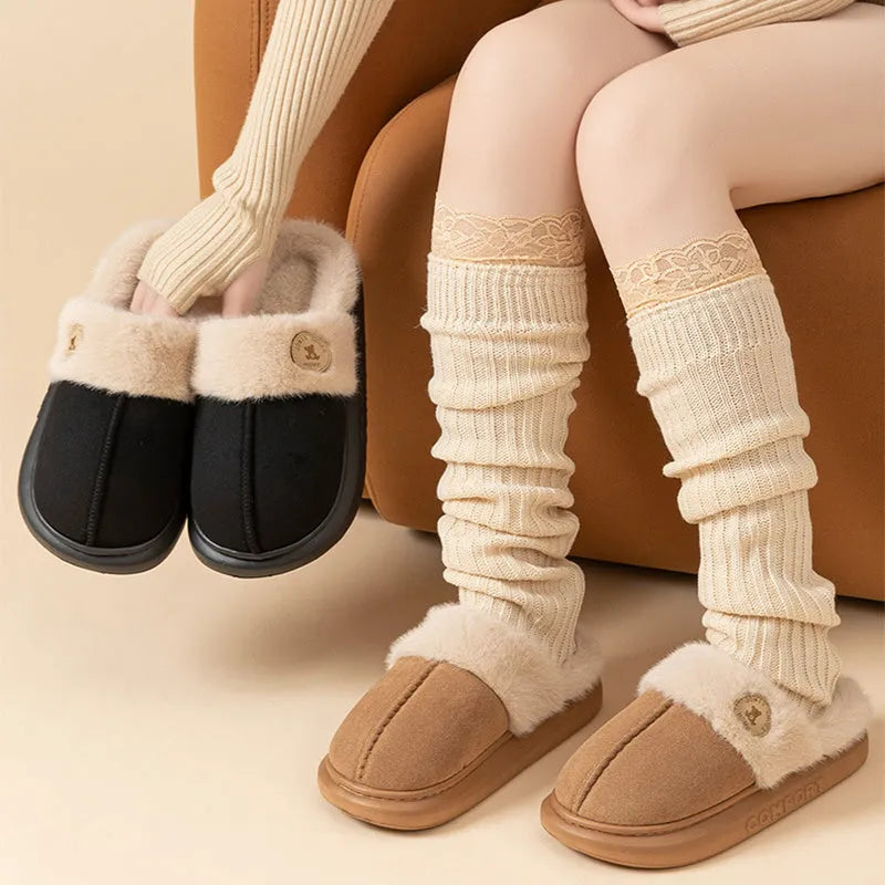 Plush fleece winter slippers with thick PVC sole and car stitching detail