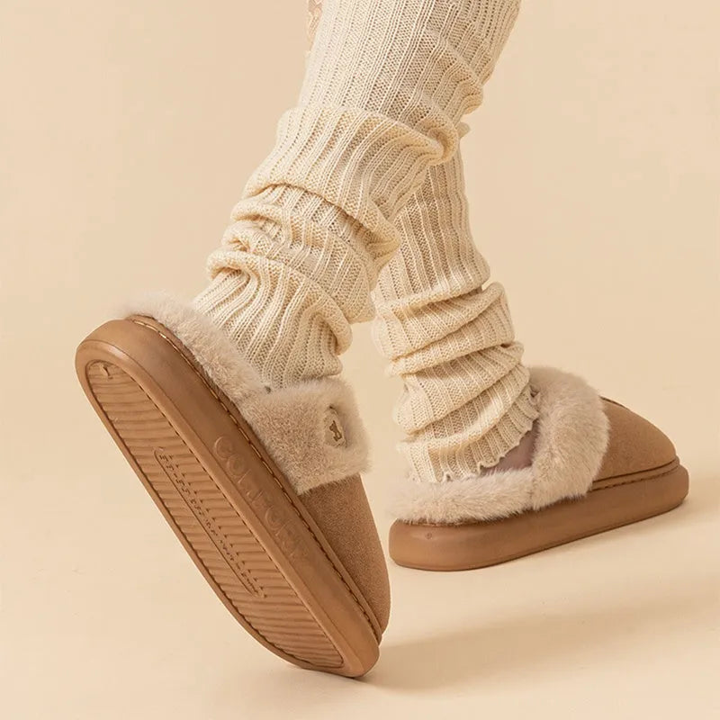 Plush fleece winter slippers with thick PVC sole and car stitching detail