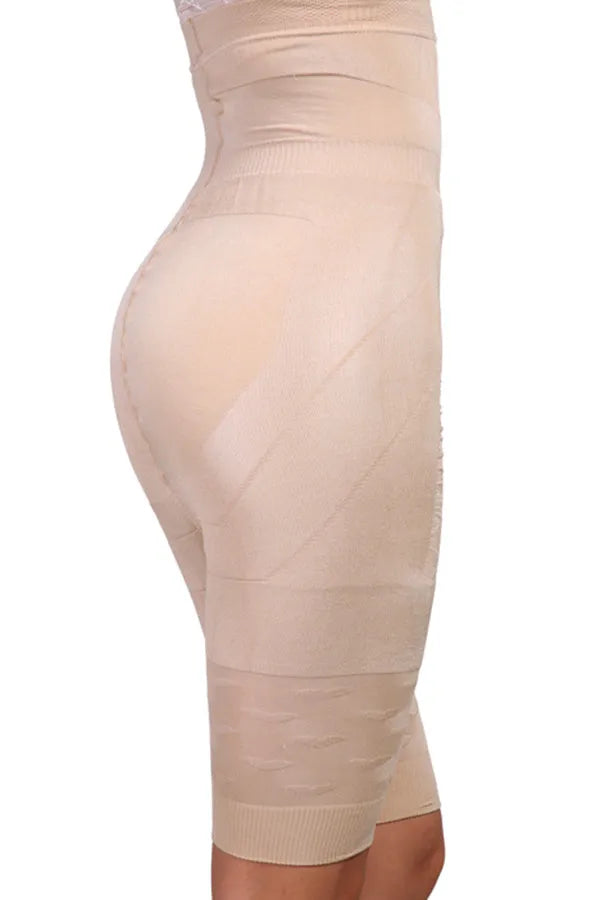 Black seamless high-waist shapewear shorts laid flat, showing the tummy control panel and leg openings.