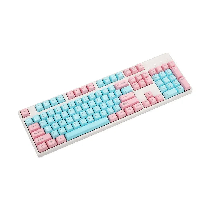 Pink opaque PBT keycap set for mechanical keyboards showing side-engraved legends on 1.5mm thick keys