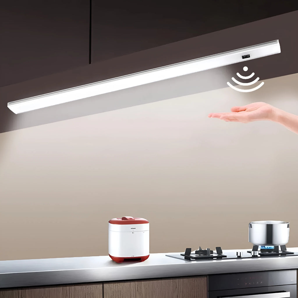 Slim aluminium profile DC LED strip bar light for cabinet or shelf mounting.