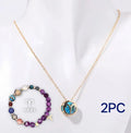 Natural stone beaded necklace and bracelet set on a display, showing adjustable necklace clasp and elasticated bracelet.