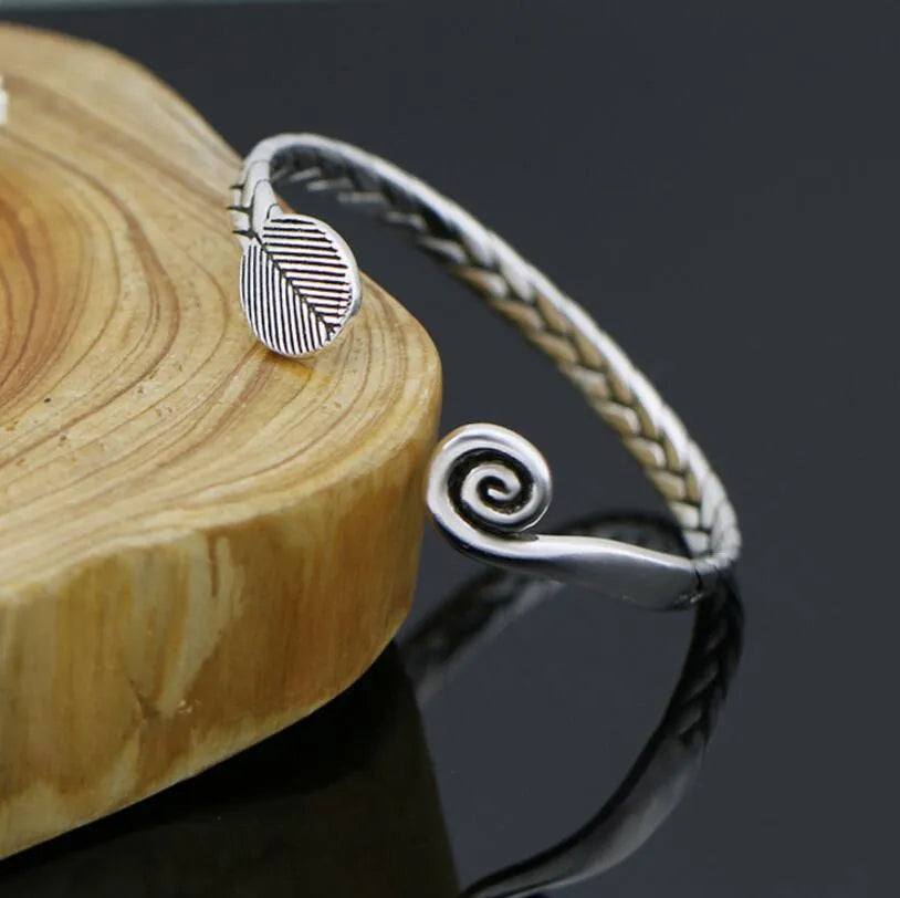 Women's Chinese retro style opening bracelet with fish design in silver colour