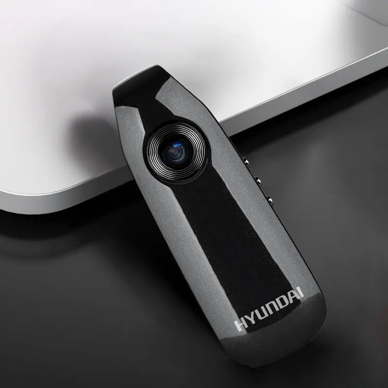 Black portable HD video recording pen with 1080p resolution and USB cable
