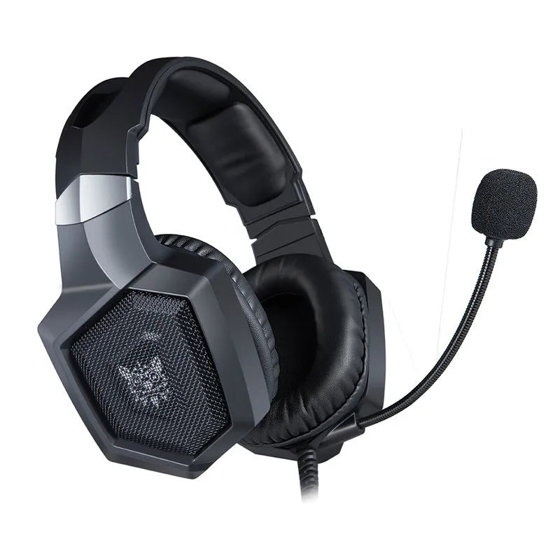 Black luminous wired gaming headset with 3.5mm plug on a desk for PC gaming