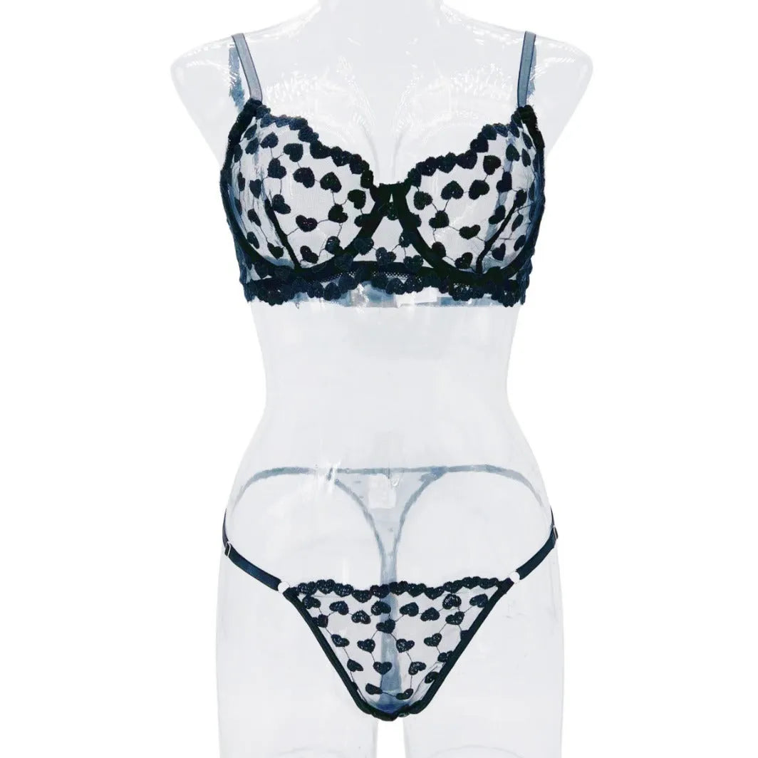 Women's mesh suit set with V-neck top and wide-leg trousers in black or red polyester fabric