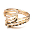 Close-up of a women's copper ring with micro-inlaid zircon stones and an electroplated finish.