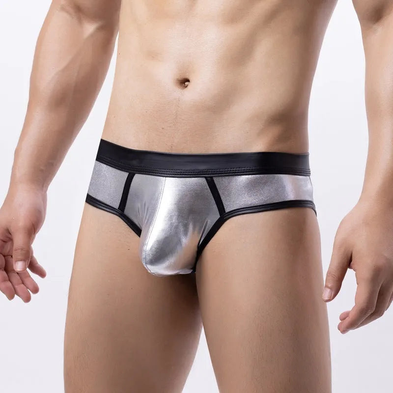 Men's gold metallic low-waist bikini swim briefs on a white background