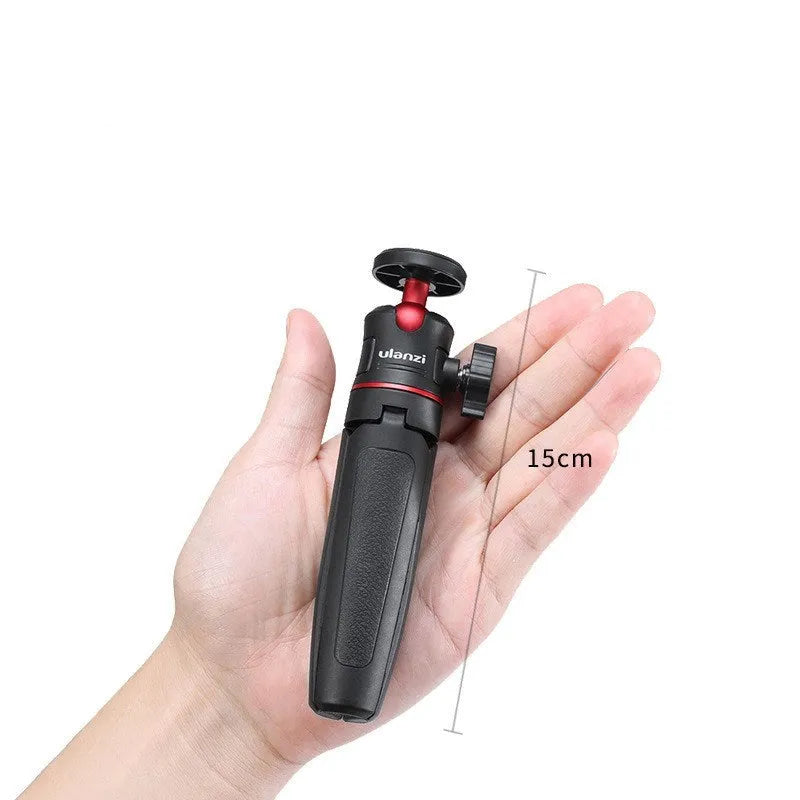 Black red and white mini aluminium tripod with extension stick for mobile phones and sports cameras.