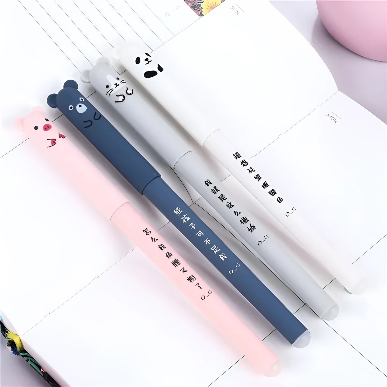 Hot erasable pen set with 0.5mm tip in black blue red colours showing pens and refills
