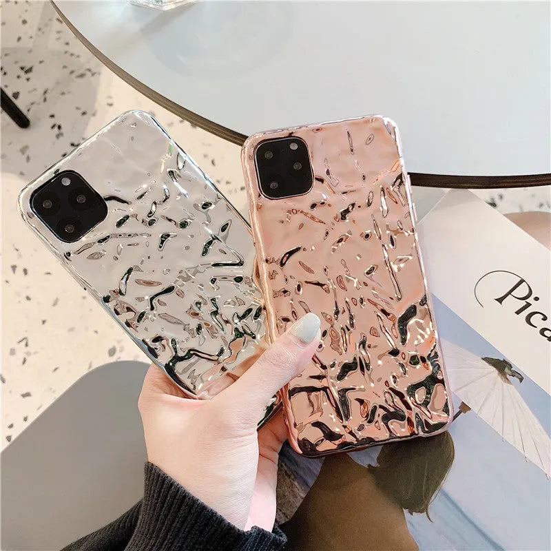 Rose gold electroplated TPU back cover case shown on an iPhone 15 Pro Max.