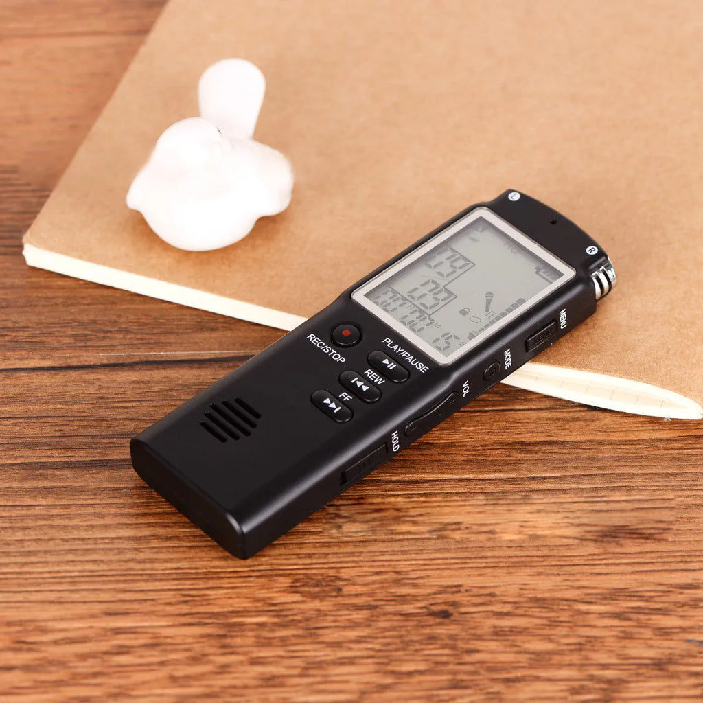 Compact black USB voice recorder with display screen, showing 16GB memory and external microphone port.